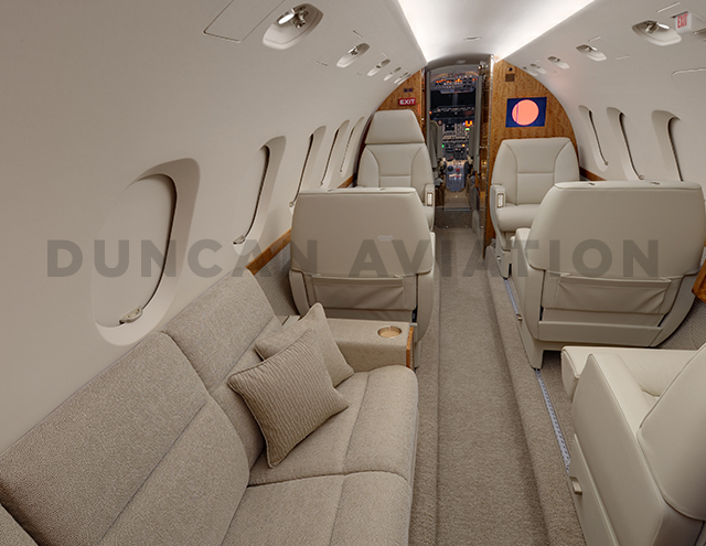 Refurbished interior of Hawker 800 by Duncan Aviation with divan and captain chairs