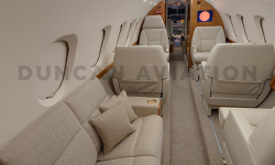Refurbished interior of Hawker 800 by Duncan Aviation with divan and captain chairs