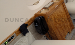 Hawker 800 interior with refurbished siderail including cup holders by Duncan Aviation