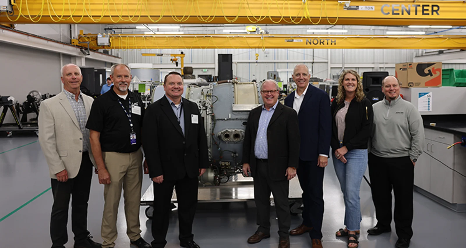 Jeff Lake, Chad Neuhalfen and Michael Griffin with Lincoln Airport Authority, Todd Duncan, Mike Minchow, Nebraska Senator Carolyn Bosn, and Kasey Harwick at the 2026 DOF Open House.